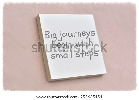 Text big journeys begin with small steps on the short note texture background