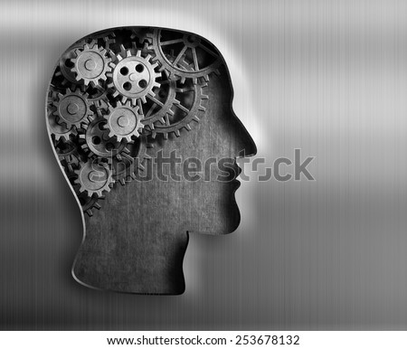 Brain model from gears and cogs in metal plate. Royalty-Free Stock Photo #253678132