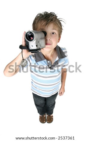 A boy recording videos or taking pictures using a digital video camera,  above perspective.