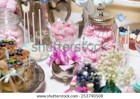 candy bar at a wedding in the style of Alice in Wonderland
