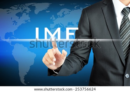 Businessman hand pointing to IMF (International Monetary Fund) sign on virtual screen