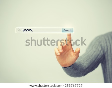 technology, searching system and internet concept - male hand pressing Search button