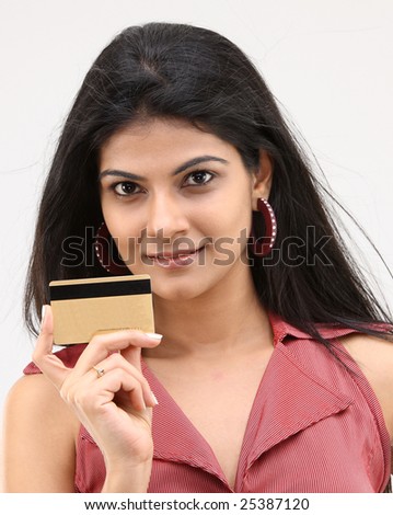 teenage girl holding credit card