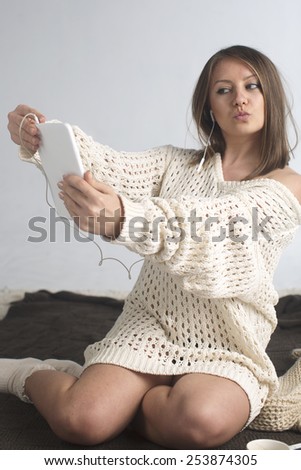 young  woman with tablet computer take selfie