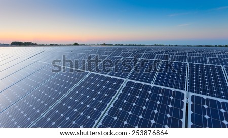 Power plant using renewable solar energy with sun Royalty-Free Stock Photo #253876864
