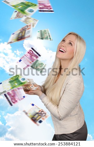 Woman smiling  with lots of banknotes