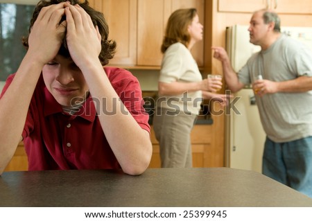 Son cries as parents fight Royalty-Free Stock Photo #25399945