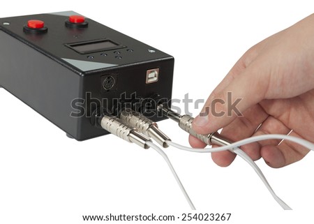 Hand inserting a wire into the switch