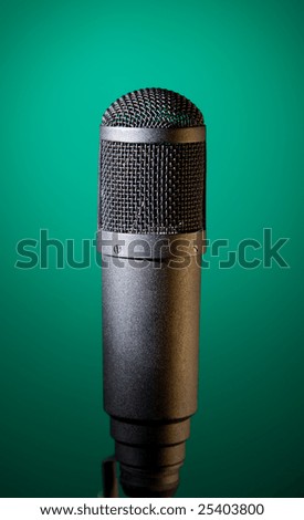 microphone on green background