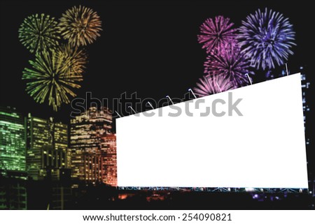 Blank billboard at night with fireworks