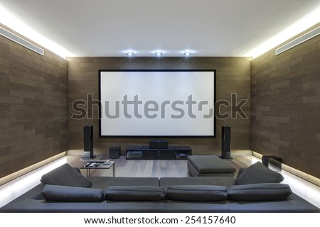 In-Home Theater in Luxury Home Royalty-Free Stock Photo #254157640