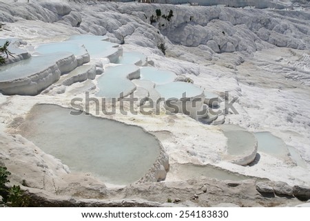 Panoramic popular Pammukkale calcareous pools in Turkey  Royalty-Free Stock Photo #254183830