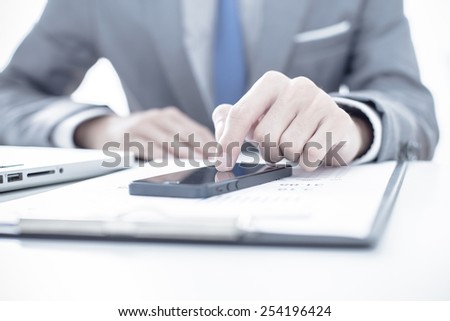 business, technology and internet concept - close up of man hands with coffee and laptop computer