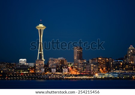 Seattle downtown with Space Needle iconic night view from Alki Beach Part