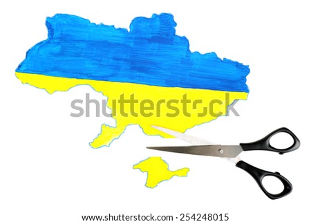 Map of Ukraine and scissors, isolated on white- concept of disintegration of the country