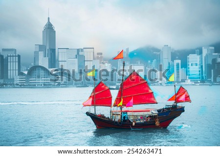 Symbol of Hong Kong - traditional wooden sailboat in Victoria harbor. 