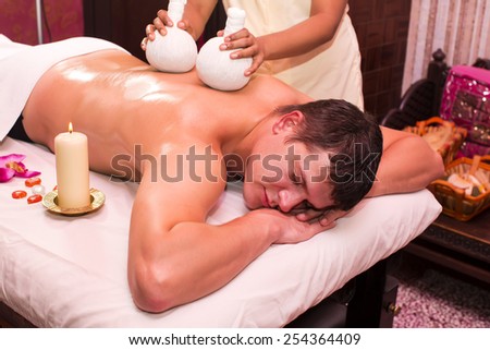 man engaged in Ayurvedic spa treatment