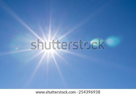 the sun with rays Royalty-Free Stock Photo #254396938