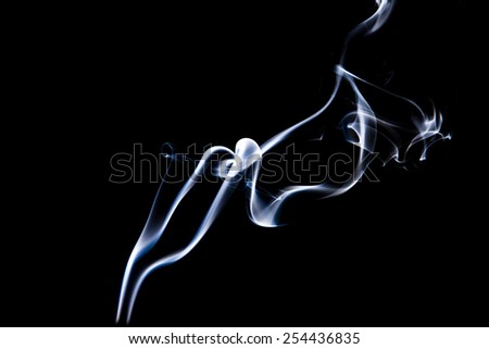 smoke with lights on black background