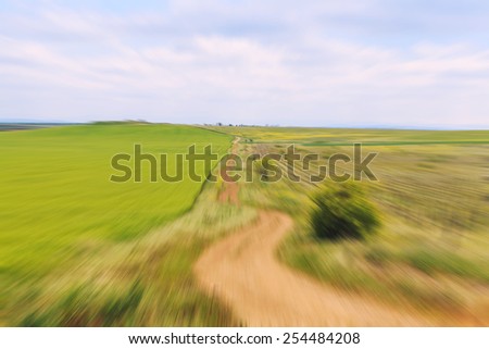 Abstract image of country road with motion blur and soft focus, retro look