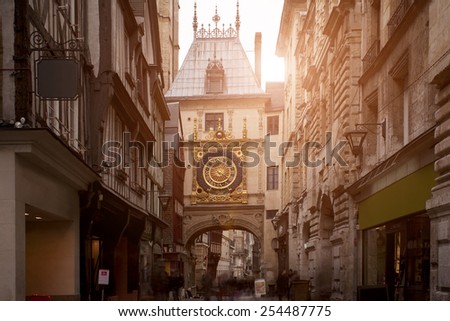 Sunset view of the Gros Horloge is a fourteenth-century astronomical clock in Rouen, Normandy, France Royalty-Free Stock Photo #254487775