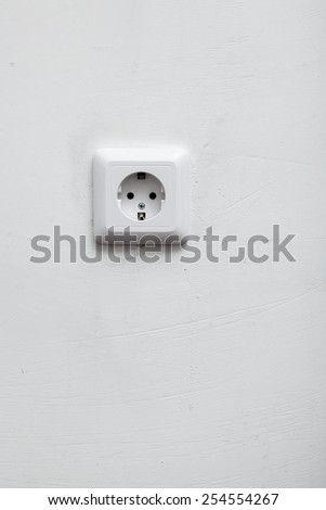 wall socket on the white wall