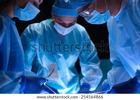 Team surgeon at work in operating. Hospital.