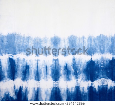 Abstract tie dyed fabric background  Royalty-Free Stock Photo #254642866