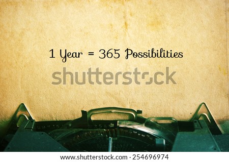 1 Year = 365 Possibilities: Inspiration Motivational Quotes on Vintage Paper Background. Royalty-Free Stock Photo #254696974