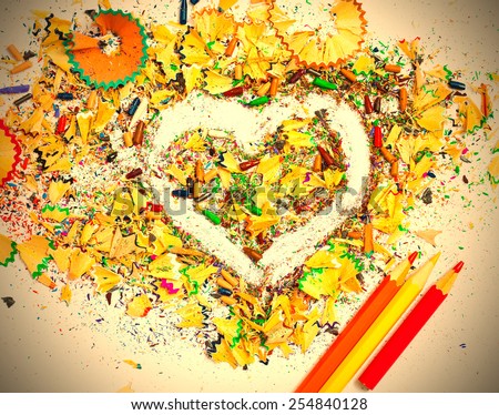 heart, three pencils and colored wooden shavings, instagram image retro style