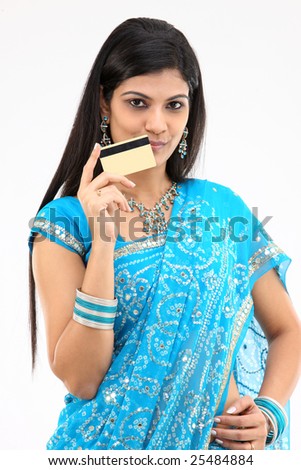 lady with fancy blue sari holding credit card