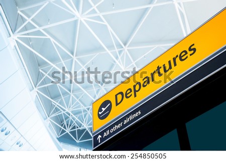 Flight information, arrival and departure board at the airport Royalty-Free Stock Photo #254850505