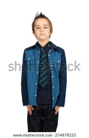 Handsome child doing different expressions in different sets of clothes: at attention