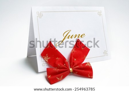 June  text on greeting card isolated on white
