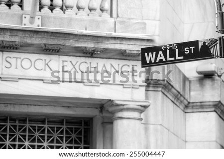 Wall street sign in New York City in black and white