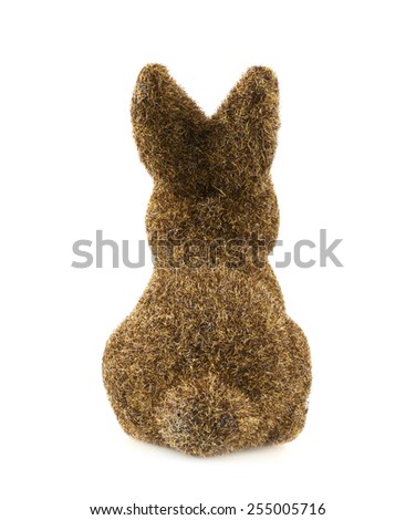 Toy bunny statuette isolated over the white background