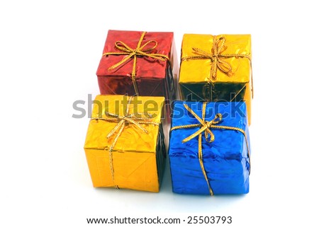 The gifts which packed into a color wrapper and have been tied up by a golden string