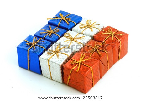 The gifts which packed into a color wrapper and have been tied up by a golden string