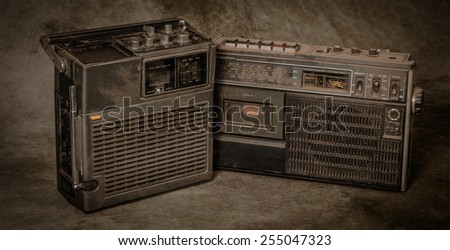 the still life retro radios on grunge background