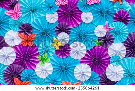 Colorful of artificial paper flowers pattern on board
