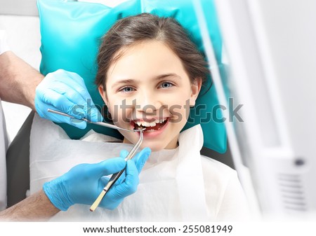 Viewed oral hygiene. Child to the dentist. Child in the dental chair dental treatment during surgery. Royalty-Free Stock Photo #255081949