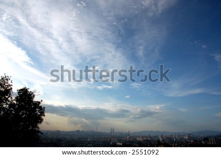 skyline of Kuala Lumpur in evening with slight hazy in the background