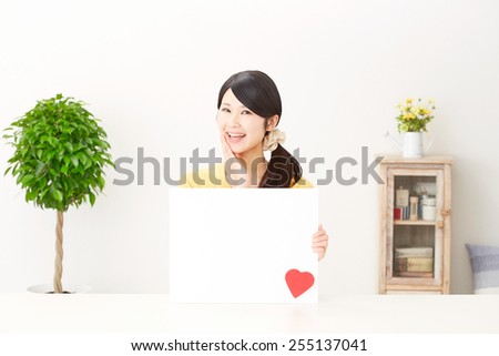 Japanese woman with heart and bulletin board
