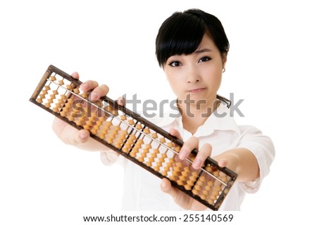 Chinese business woman holding traditional abacus on white background.