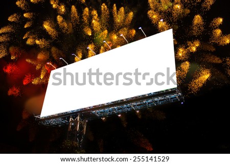 Blank billboard at night with fireworks
