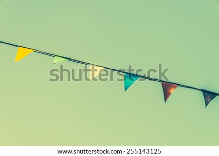 Colorful flag on blue sky - vintage effect style pictures