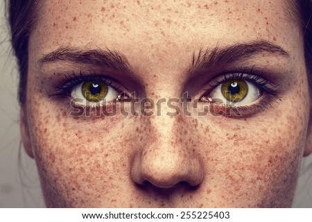 Eyes nose woman portrait with freckles Royalty-Free Stock Photo #255225403