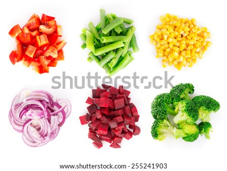 Heaps of different cut vegetables isolated on white background. Top view. Royalty-Free Stock Photo #255241903