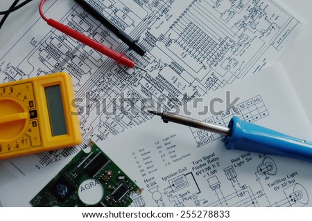electronics electrician engineer wiring diagrams and tools background Royalty-Free Stock Photo #255278833