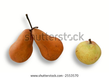 Three organic pears isolated on white background.